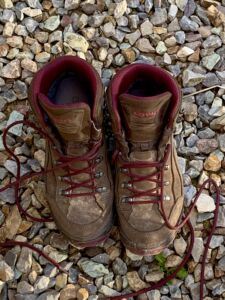Why Kat is focused on land photo of hiking boots
