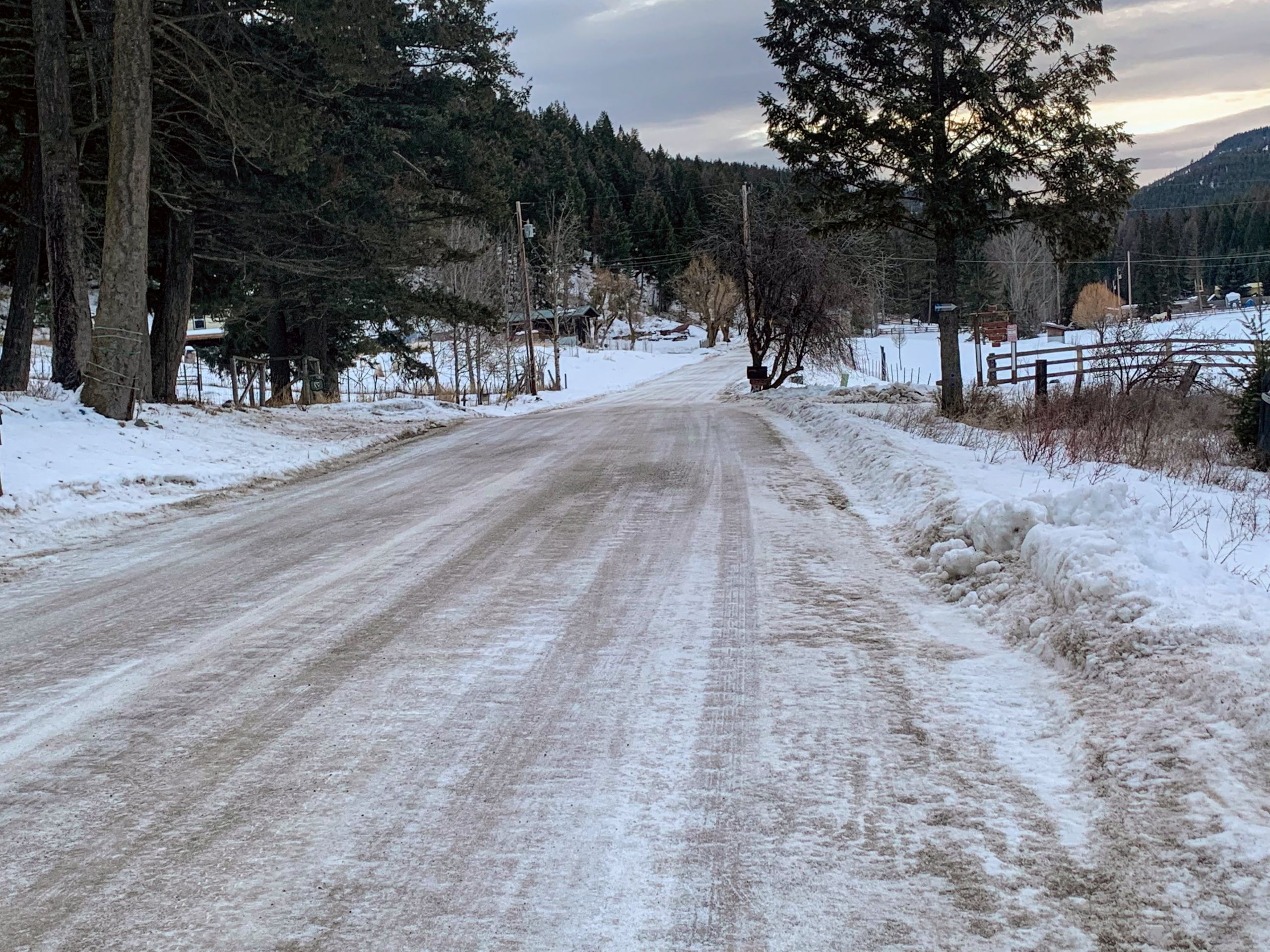 Road Maintenance in Kalispell MT picture of county road in winter